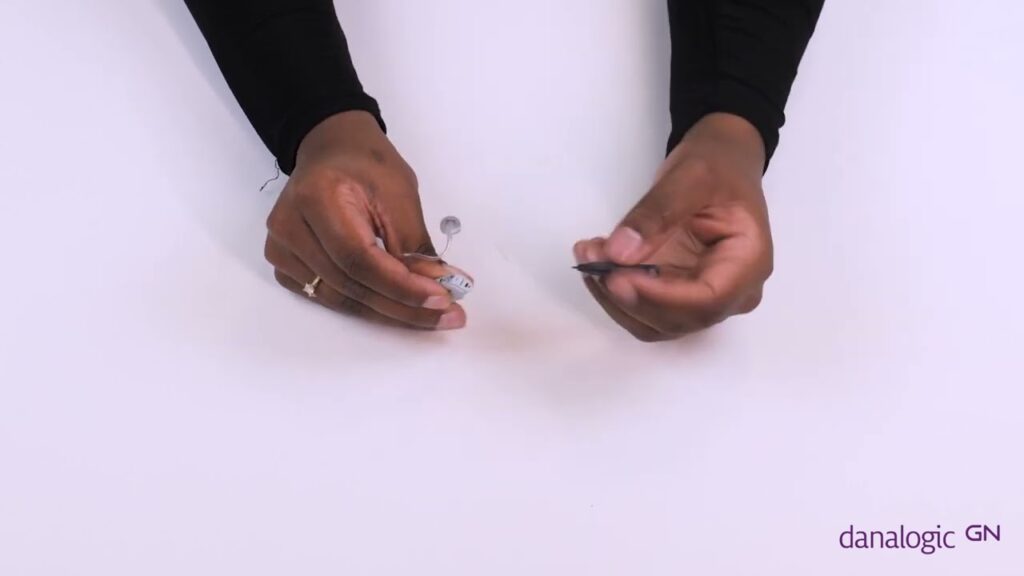 how to use the battery lock on  your Danalogic hearing aids